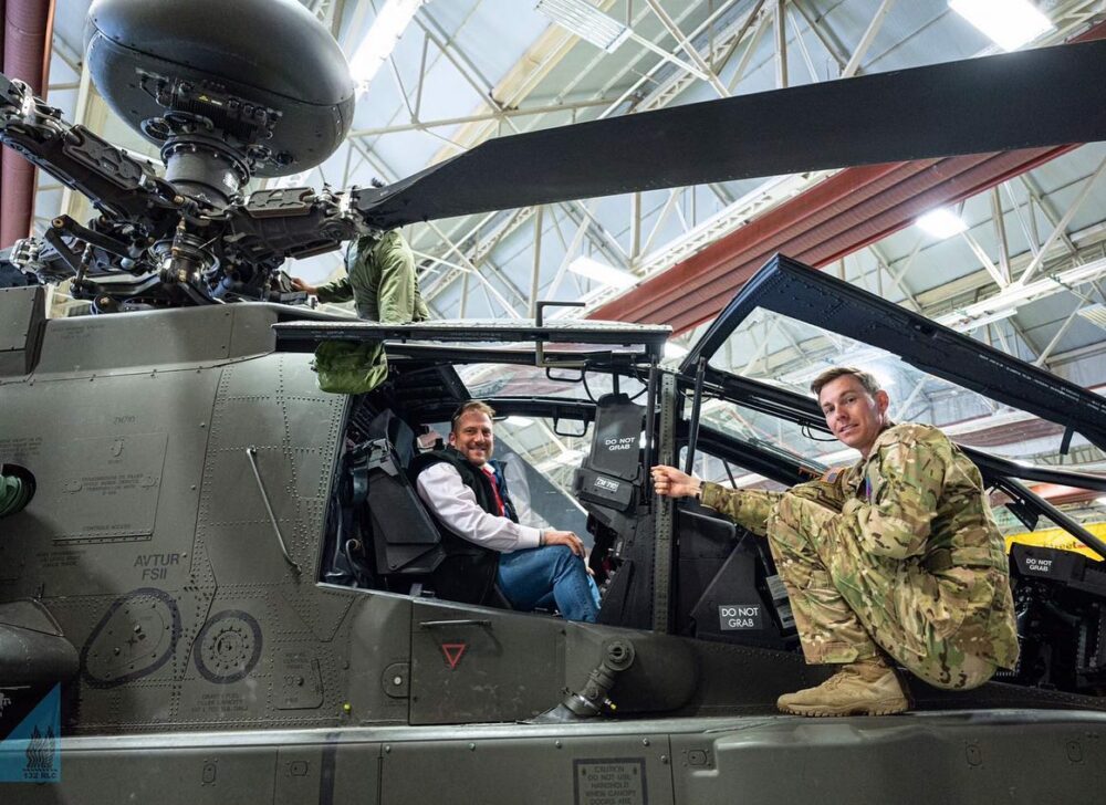 Olly Magnus in an Apache helicopter